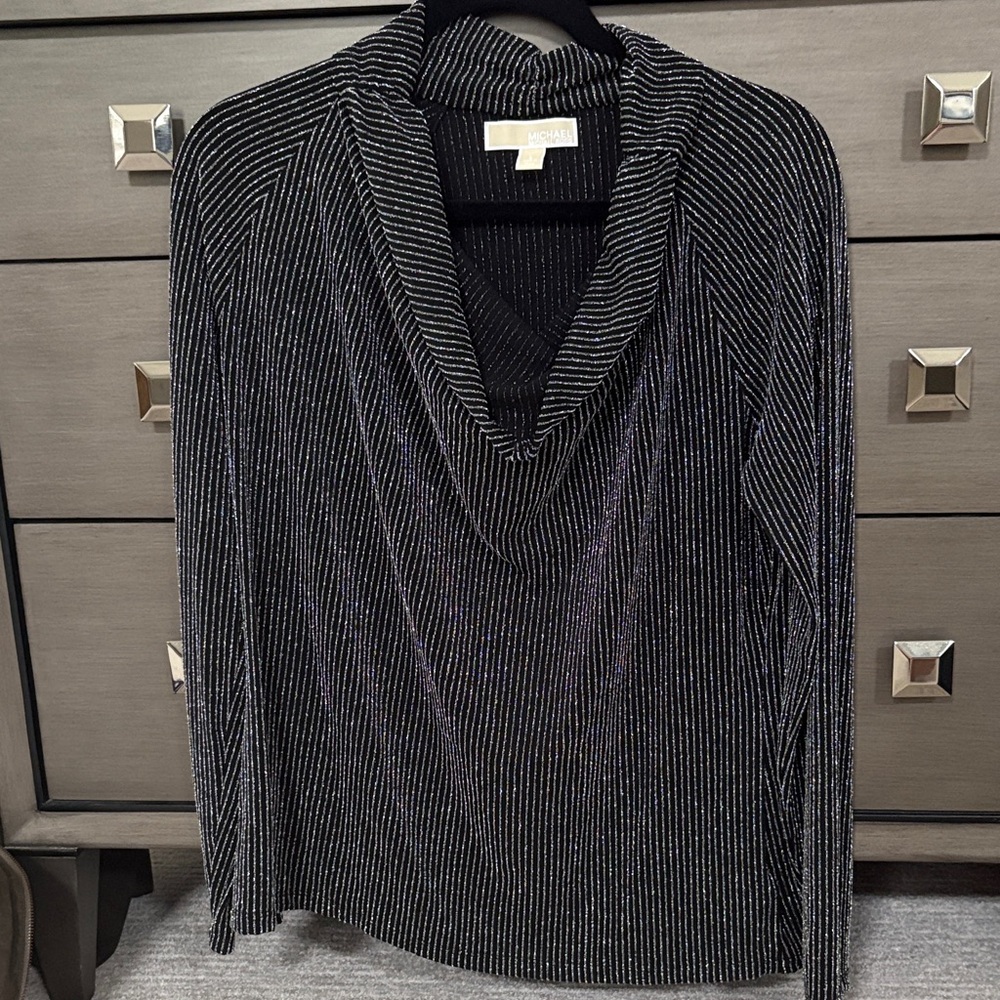 Michael Kors black and sparkling silver cowl neck top.